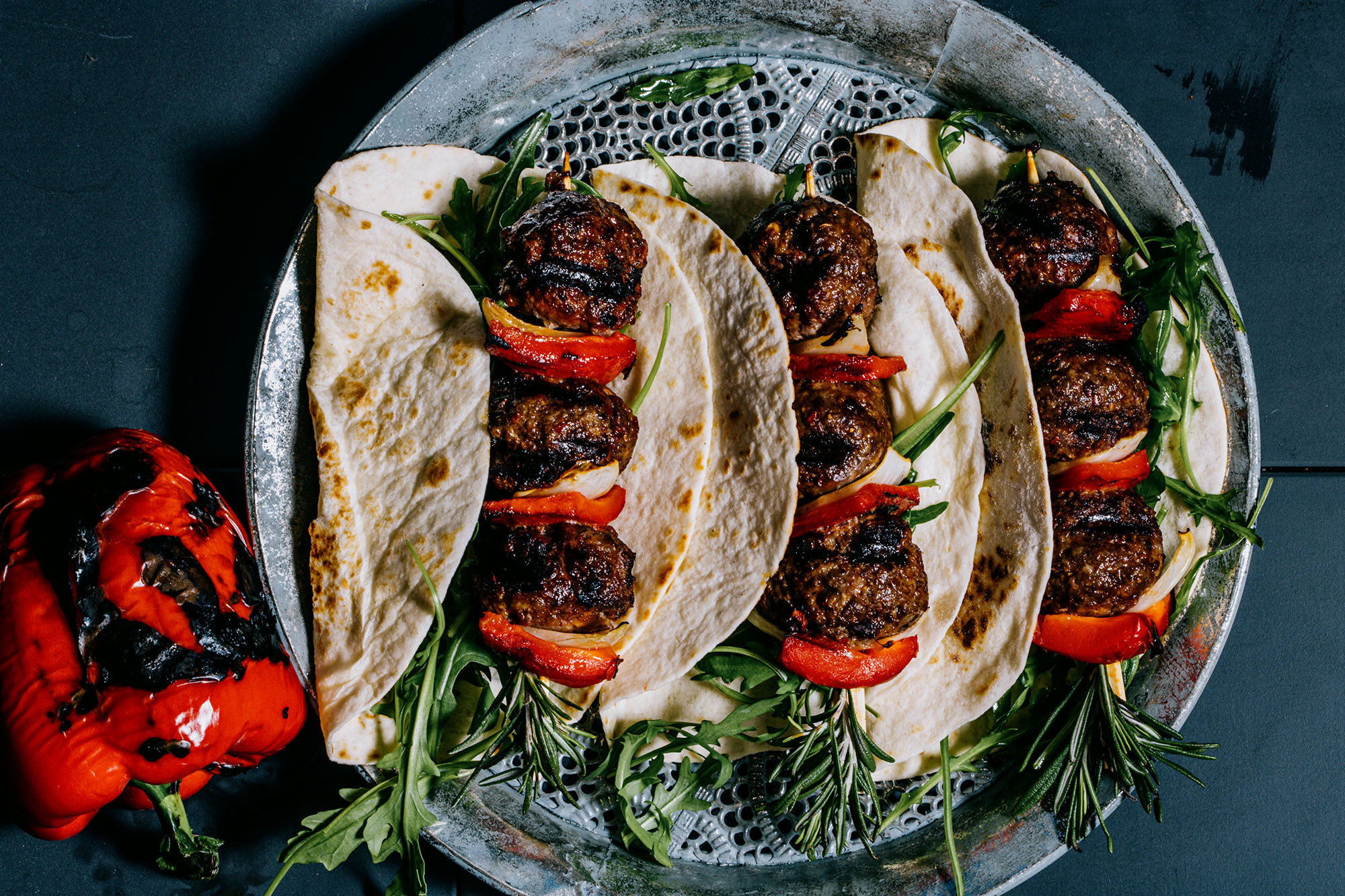 Spicy meatballs & roasted peppers from the BBQ - Grate Goods